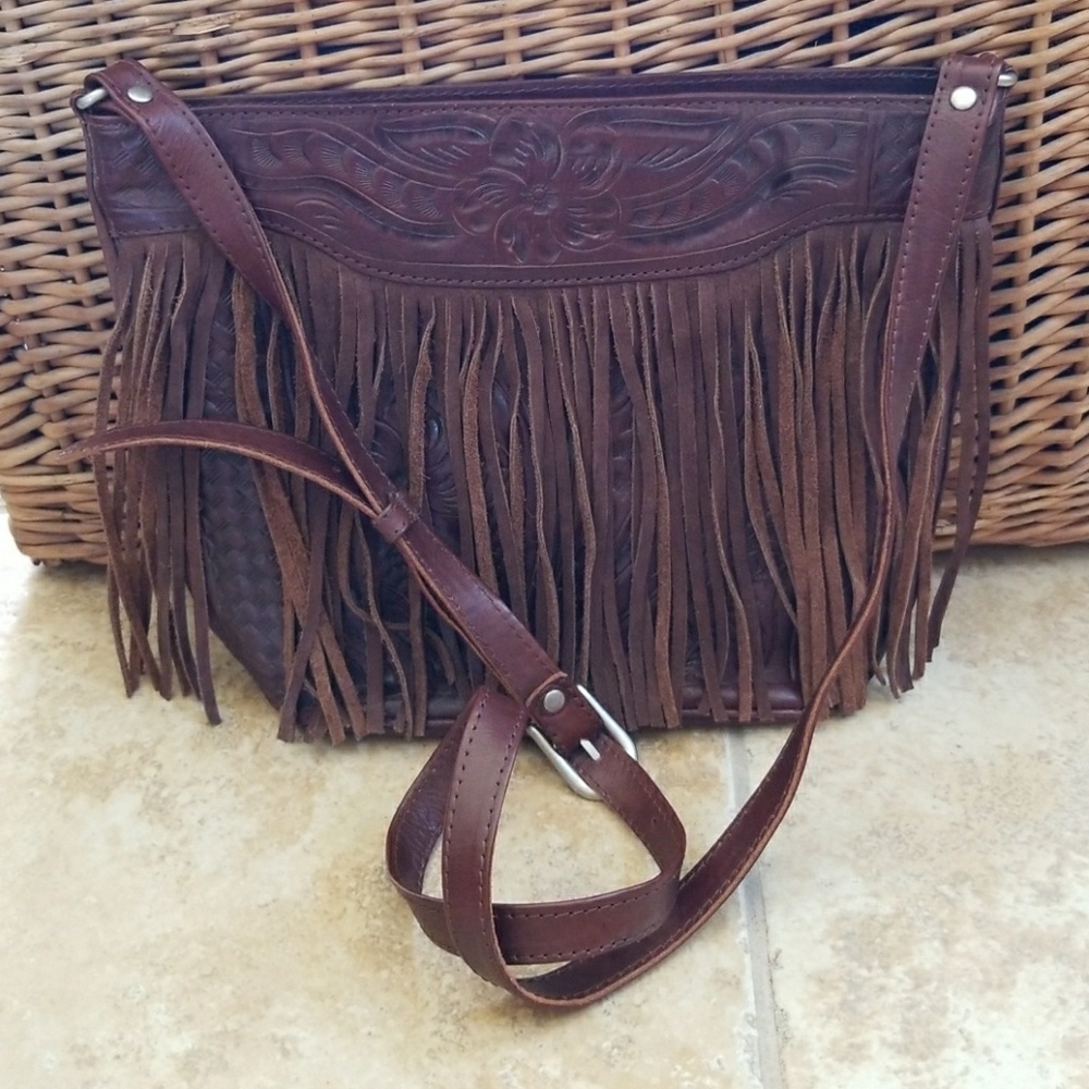 Leather purse with fringe and embossed detailing
